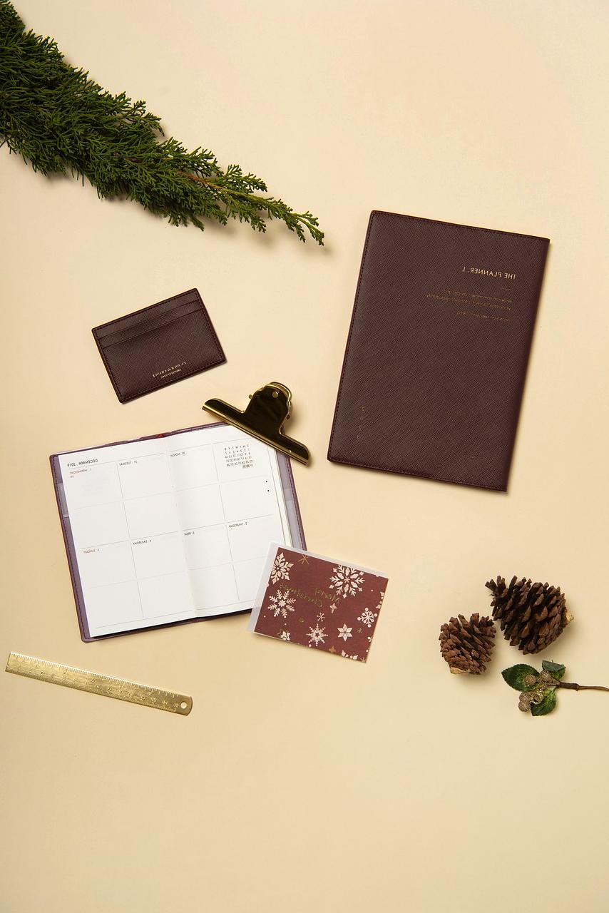 Organized desk with planner and coffee