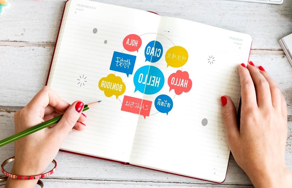 Planning and scheduling calendar with notes and digital devices